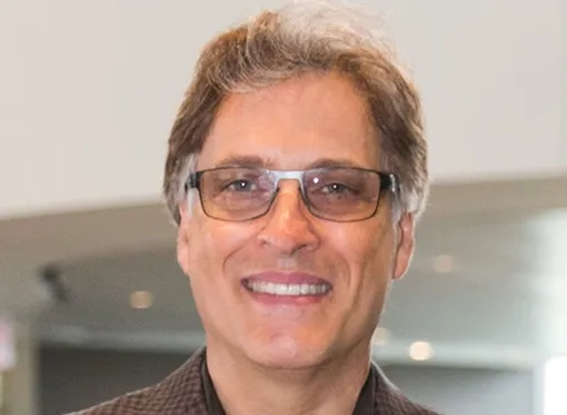 Брайан Уззи.