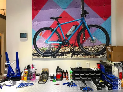 bicycle repair ship tools and poster
