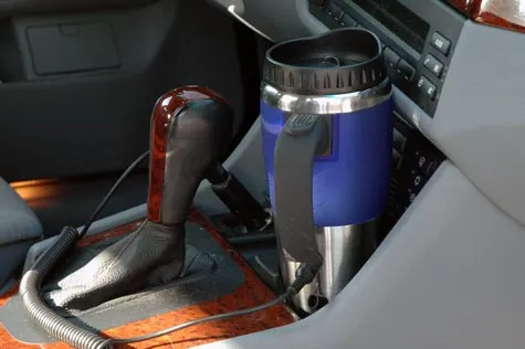 термокружка рядом с рычагом кпп