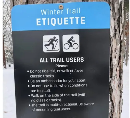 warning sign on ski trail