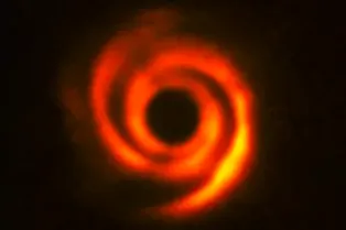 Звездная система с «рукавами», как у галактик, может скрывать формирующуюся планету Звездная система с «рукавами», как у галактик, может скрывать формирующуюся планету