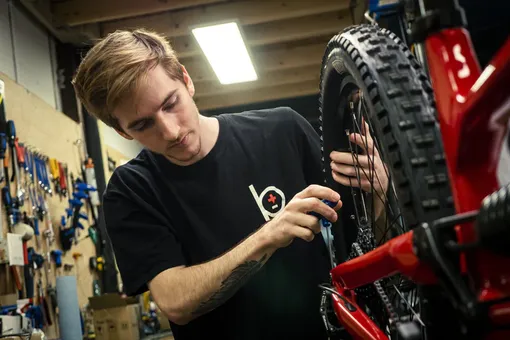bicycle service assistant at work