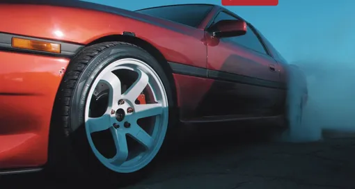fast car wheel in focus smoke