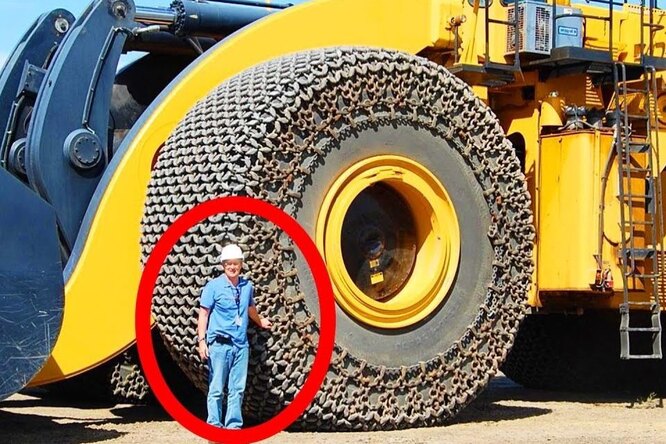 Монтаж цепей на колеса в два раза выше человека