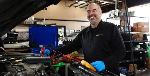 smiling car technician smiling car technician