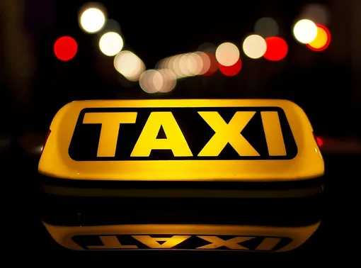 TAXI in night traffic. Ljubljana, Slovenia