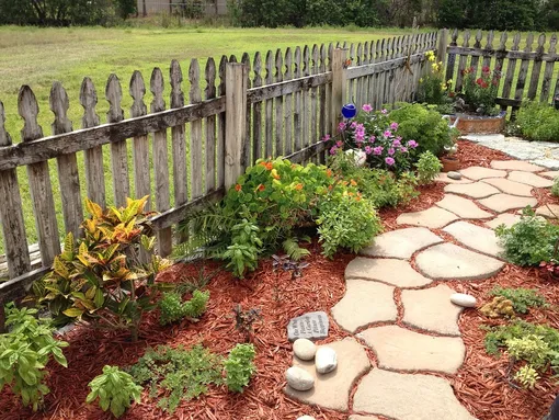 wood mulch and stone pathway