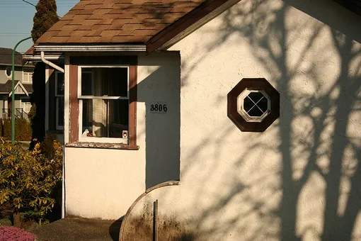 shadows on a countryside house shadows on a countryside house