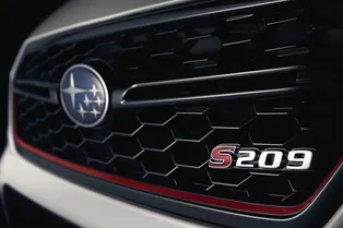 Subaru показала тизер новой модели STI S209 Subaru показала тизер новой модели STI S209