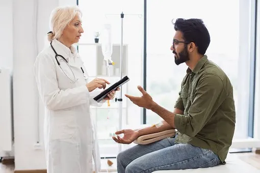 patient and doctor discussing patient and doctor discussing