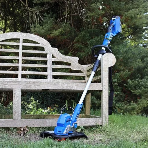 синий триммер для травы