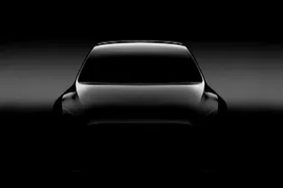 Tesla показала тизер компактного кроссовера